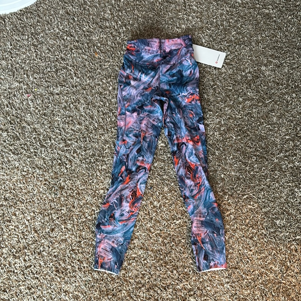 lululemon high rise tight 25 inch leggings. blue purple pink and orange